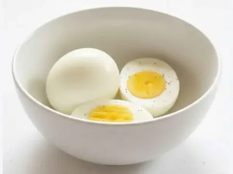 Two freshly boiled eggs in a bowl